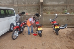 our techs fitting motor bikes tracking devices